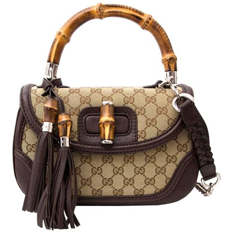 gucci bamboo bag price|gucci monogram bamboo handle bag.